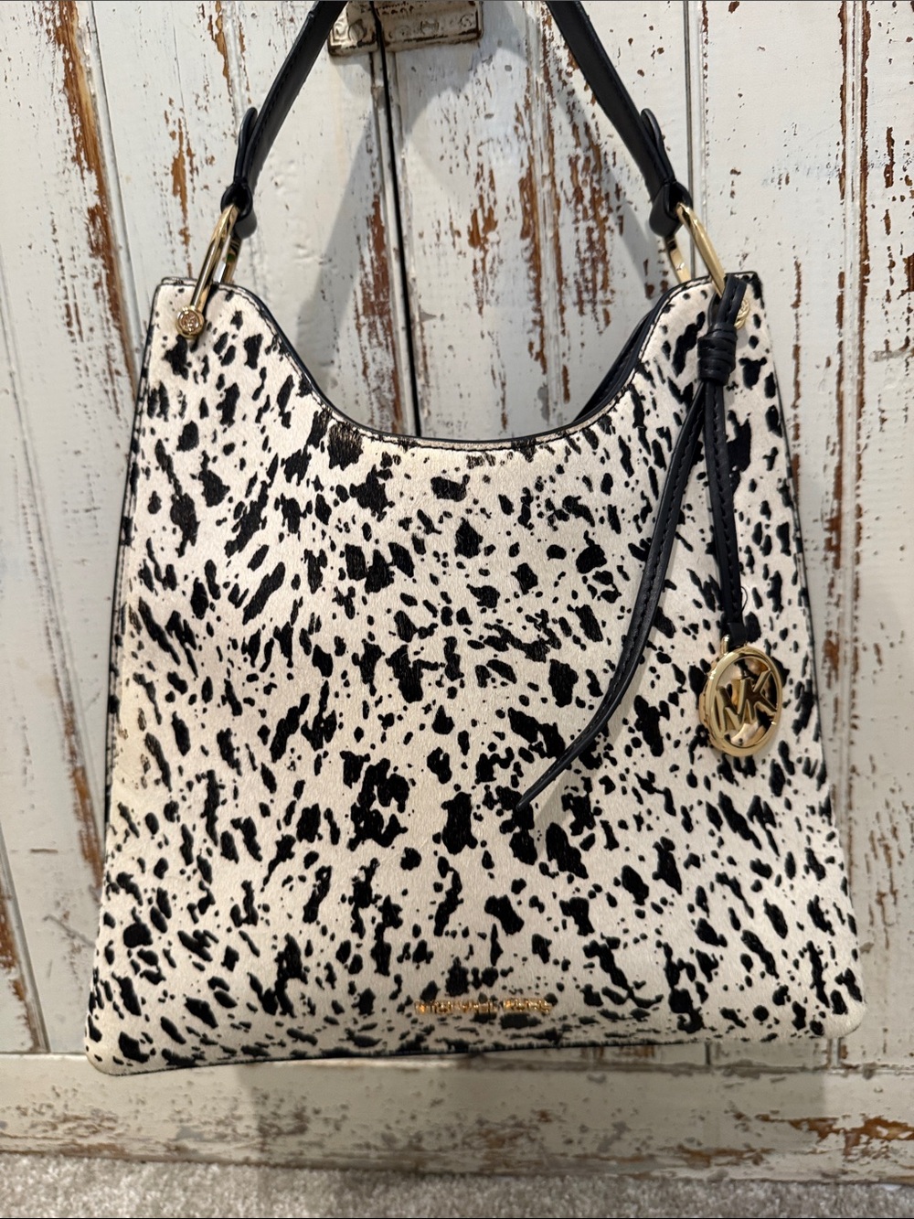 Michael Kors Black and White Spotted Hobo with Gold Hardware